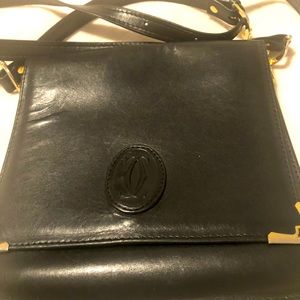 Beautiful black leather purse designer Cartier Paris!